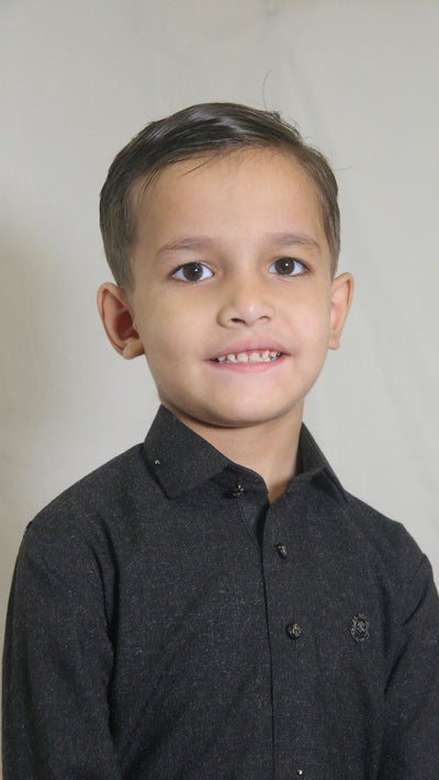 Malesian Black kids kameez shalwar with black logo buttons, front badge, zipper sleeves, and golden collar accent by Asjal Clothes Pakistan.