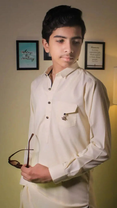 Opal Off White Kameez Shalwar in premium wash & wear fabric with blue collar contrast and accessory embellishments – Asjal Clothes Pakistan.