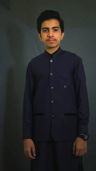 Purple Luxe Signature Waistcoat with Premium Wash & Wear Suit featuring velvet contrast, badge, and D-bar back design – Asjal Clothes Pakistan.